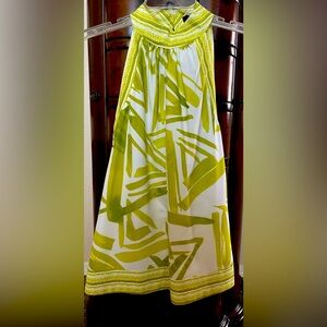 Fresh Sleeveless blouse lime green on ivory base . Unique and stylish size S